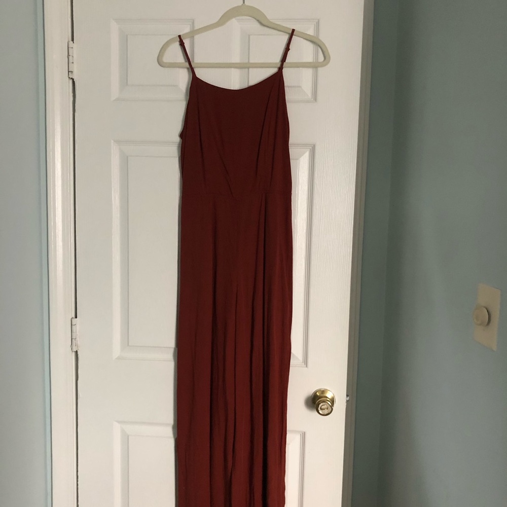 burnt orange pantsuit, slits in legs halfway up